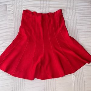 Bright red skirt, stretchy material, size S